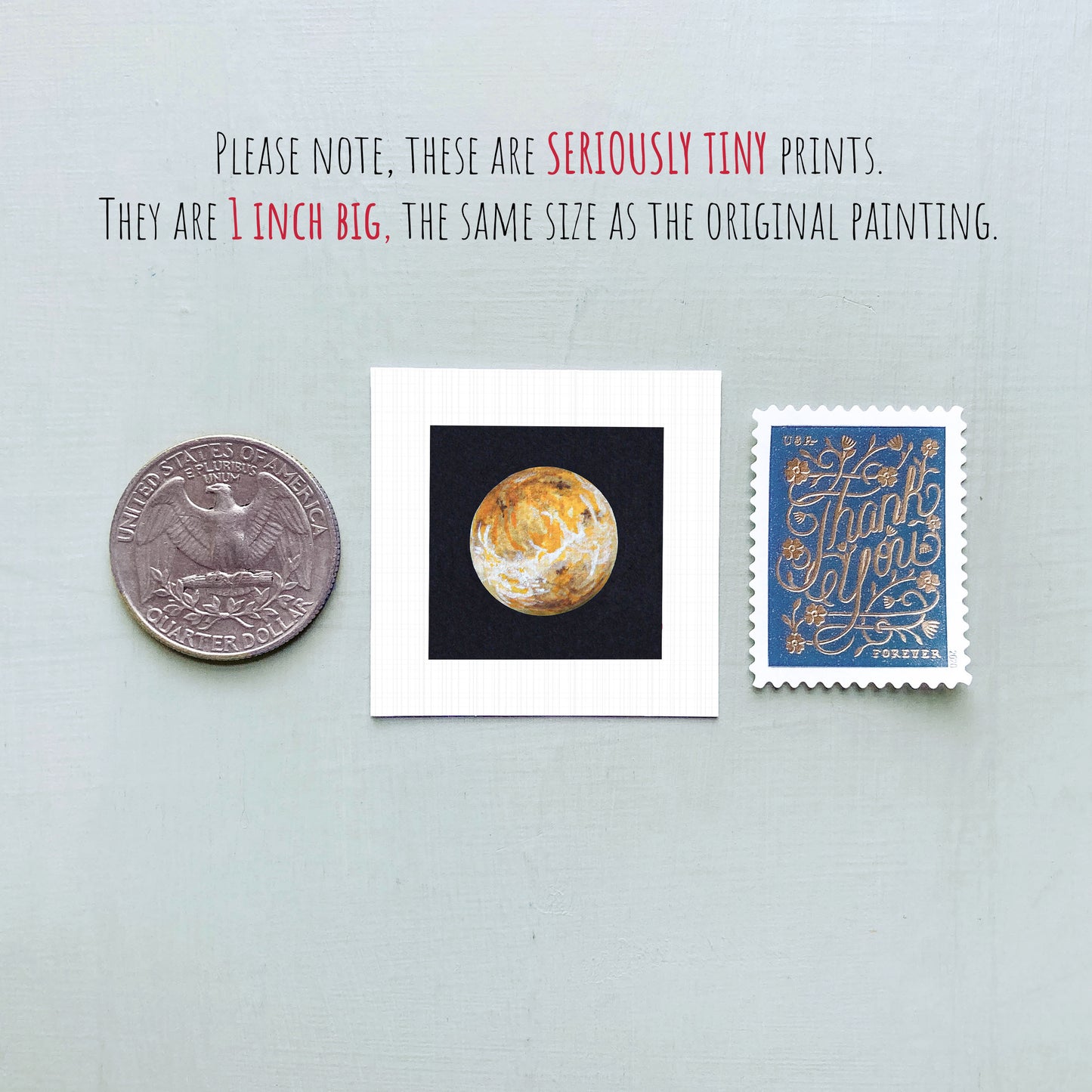 three small prints: a quarter, a square print of a planet, and a postage stamp.