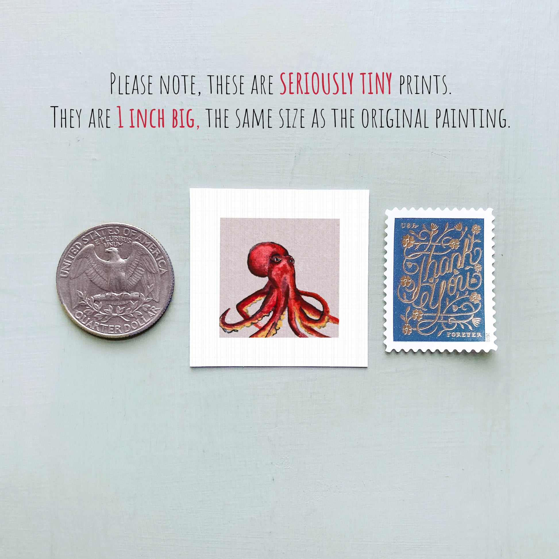 a collection of three small items: a quarter, a stamp, and a painting of an octopus.
