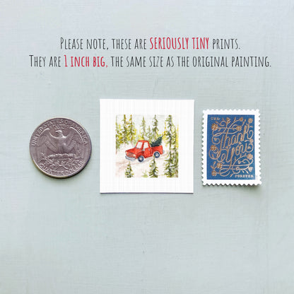 three small prints: a quarter, a postage stamp, and a painting of a red truck.