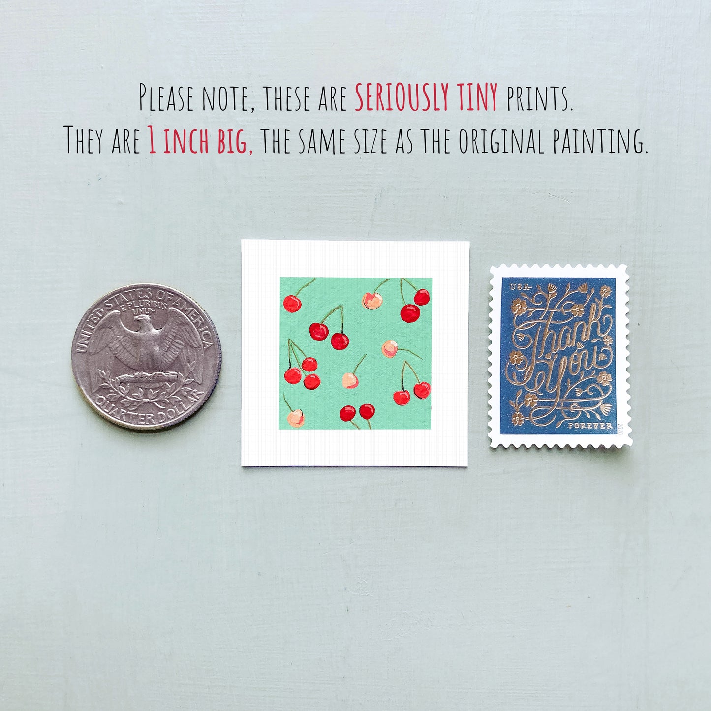 three small artworks, including a coin, a square with cherries, and a postage stamp, all of which are described as "seriously tiny prints" and "the same size as the original painting".
