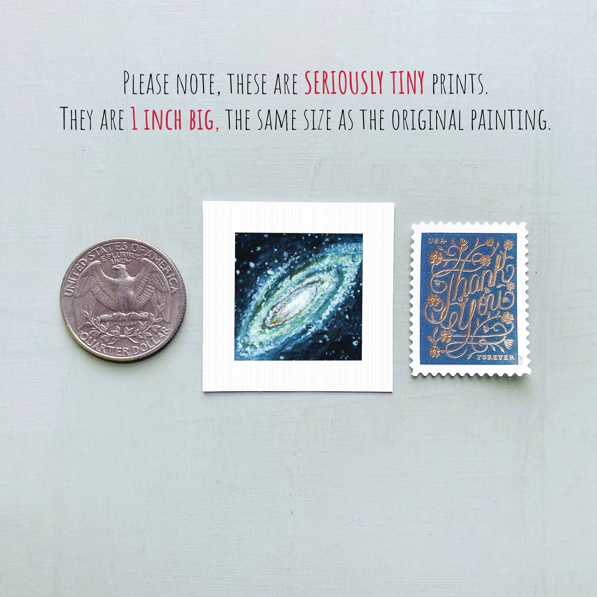 three small prints: a quarter, a painting of a galaxy, and a postage stamp.
