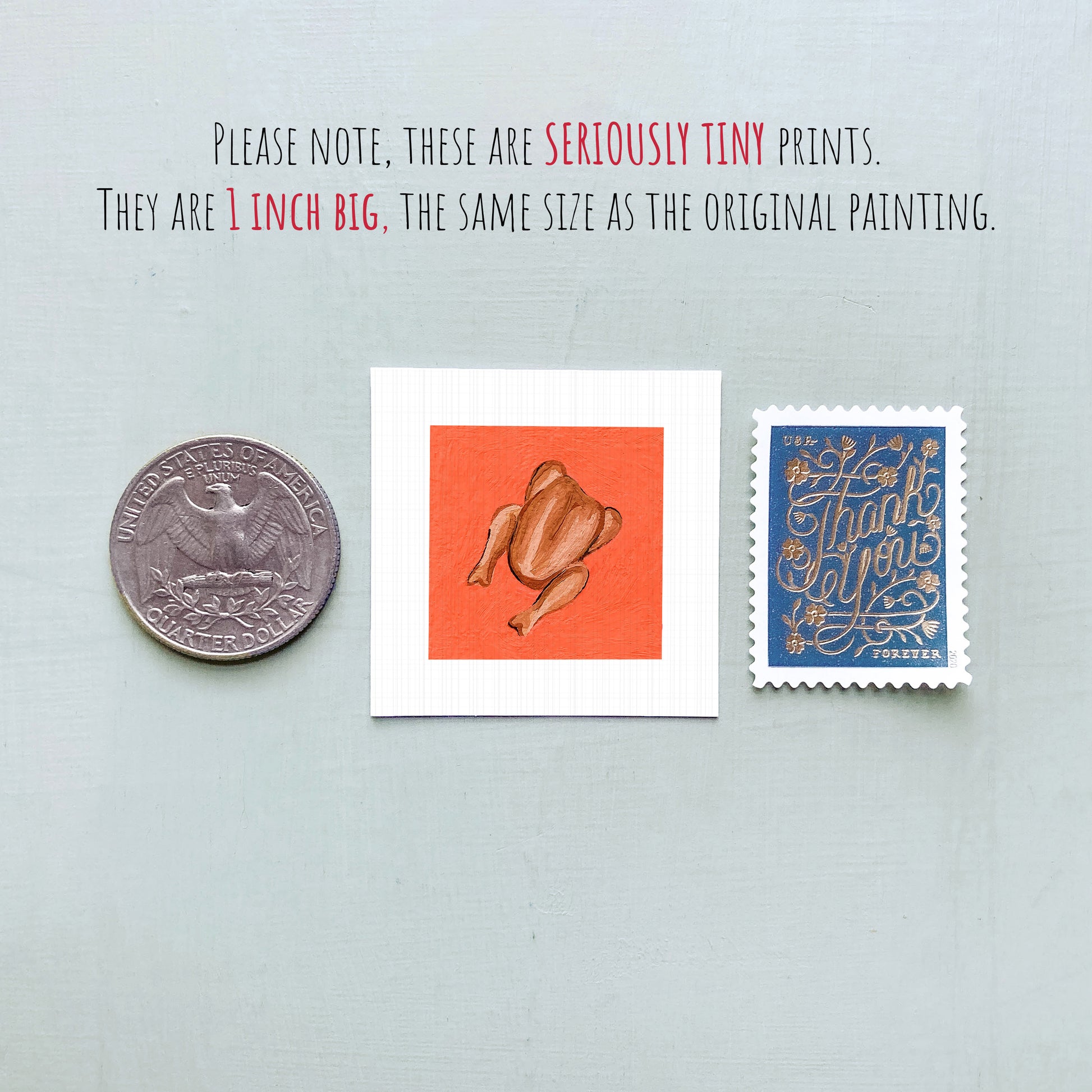 three small, seriously tiny prints: a silver coin, a white square with an orange background depicting a cooked chicken, and a blue postage stamp with gold lettering.