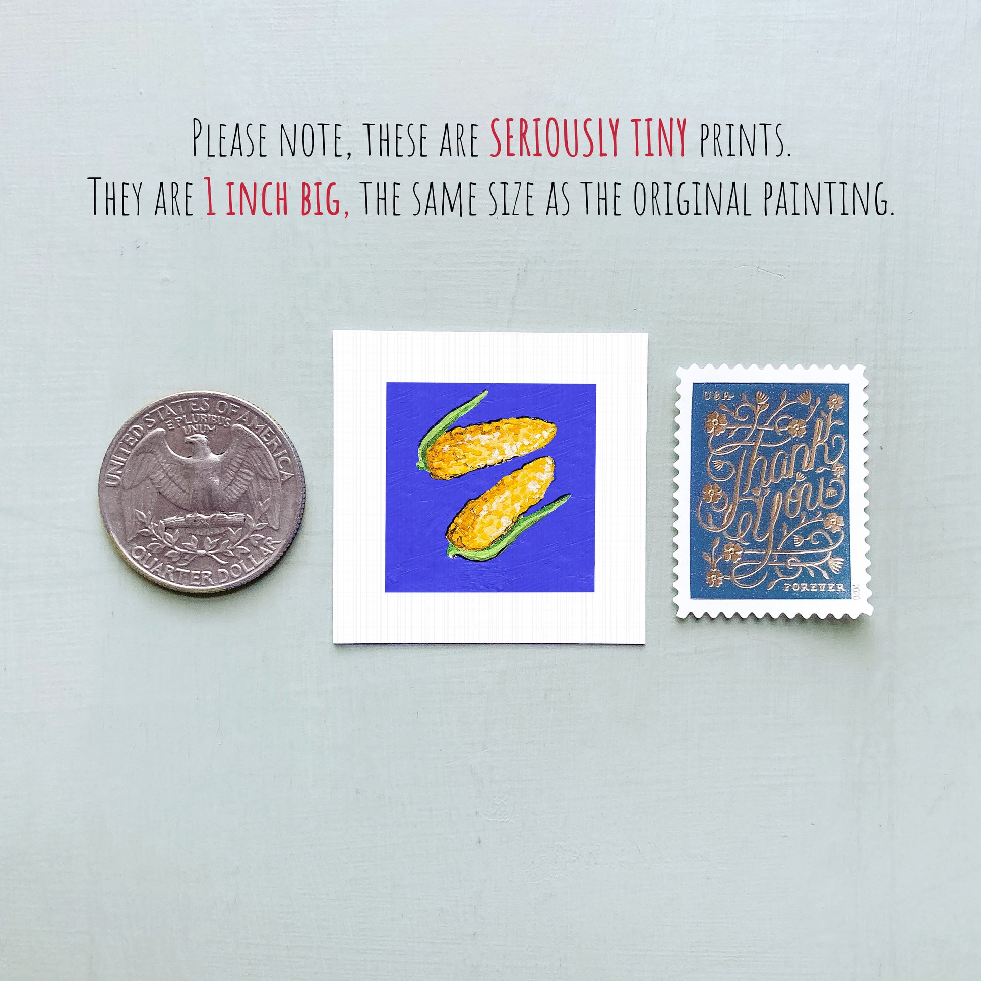 three small prints: a quarter, a square print with a blue background and yellow corn, and a postage stamp.