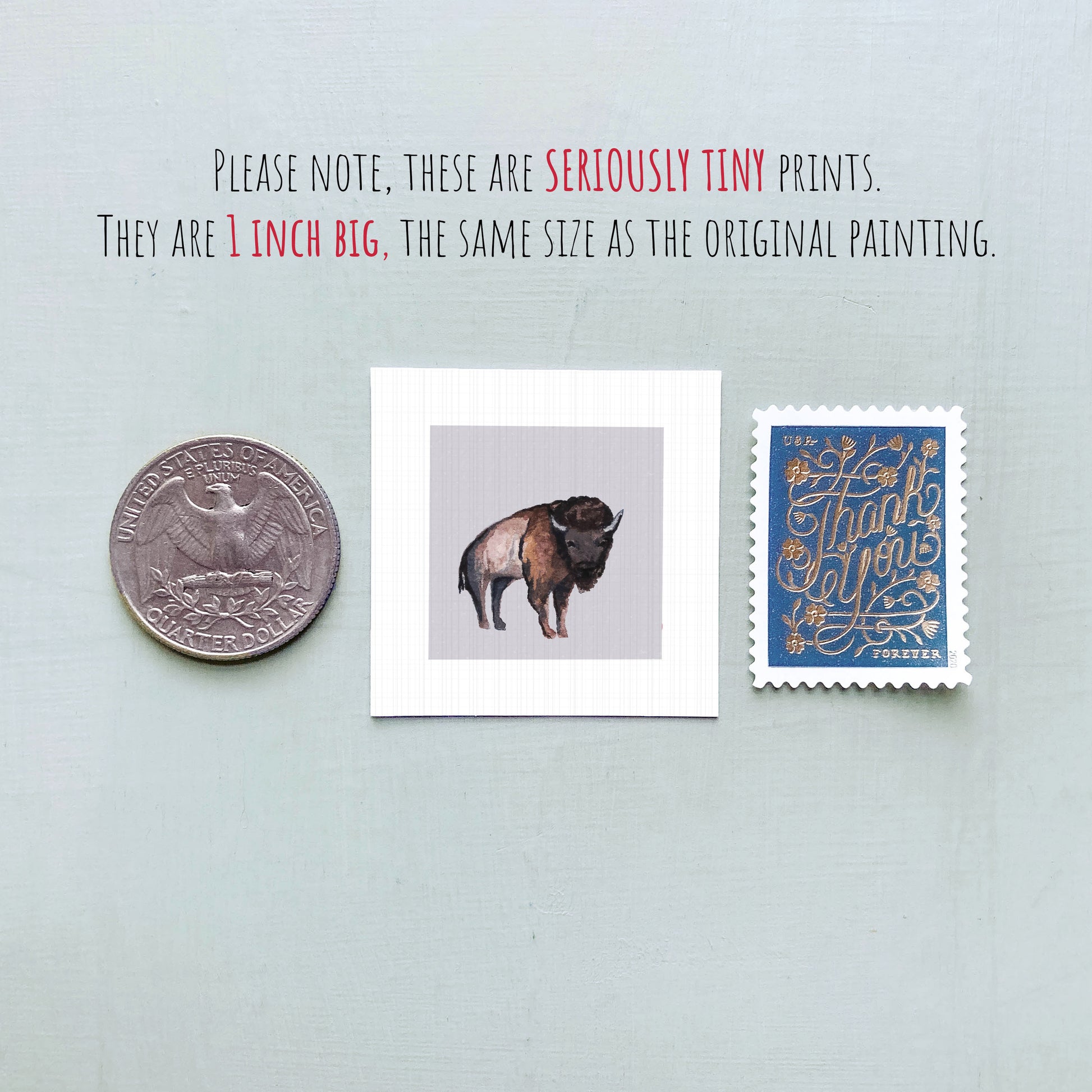 a collection of three small items: a quarter, a square print of a bison, and a postage stamp.